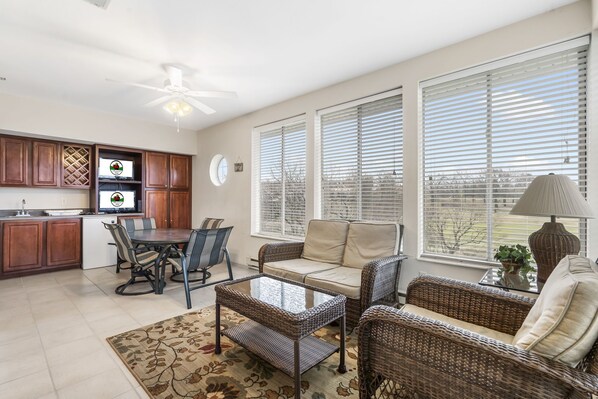 Sun Room with Extra Seating and Overlooks Thousand Hills Golf Course