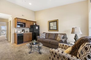 Living Area with Sofa Bed, Cable TV/DVD, and a Kitchenette