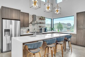 Fully Equipped Gourmet Kitchen and a Large Center Island