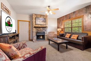 Living Room with Sofa Sleeper, Smart TV, Gas Fireplace, with  Native American-Inspired Decor