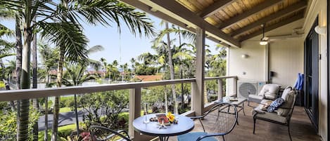 Surf & Racquet 9-303 offers a picturesque back drop from its spacious Lanai!