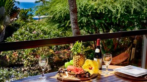 Lanai with a table and seats