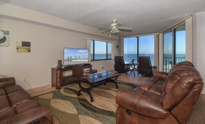 Spacious interior living room and lookout of new smyrna beach vacation rental