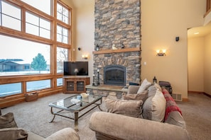 Read a book by the fireplace | Main Level