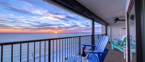 Sip your cup of joy watching incredible sunsets on our oversized 30’ balcony 