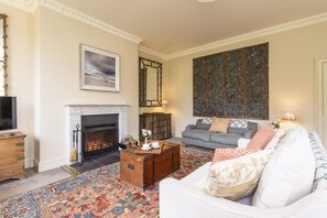 Ground floor:  The elegant sitting room with open fire