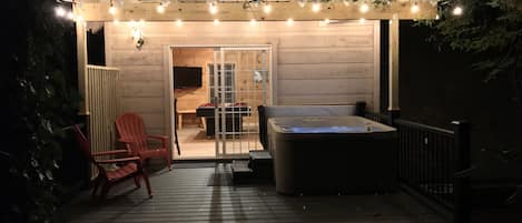 Relax in privacy in our 4 person hot tub with views of woods. 
