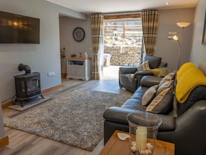 Livingroom with bifold door to your patio area