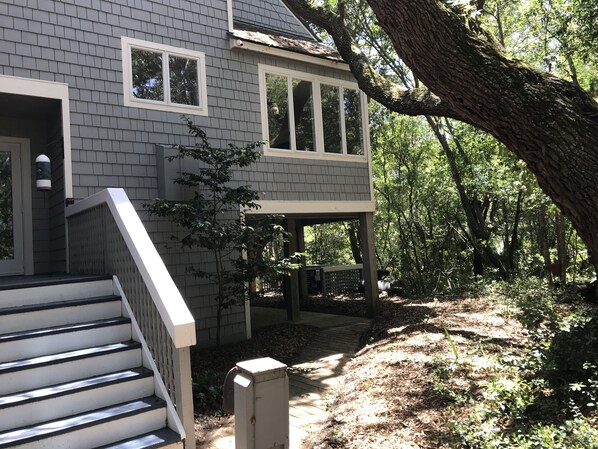 Nestled in Oak trees, our home overlooks a lagoon and golf course with privacy