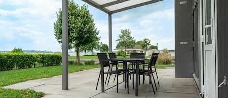 Plant, Table, Furniture, Sky, Chair, Shade, Interior Design, Outdoor Furniture, Architecture, Tree