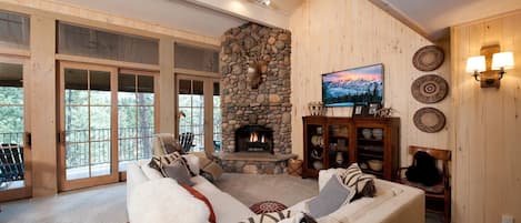 Comfortable Living Room with Fireplace, Large TV, Deck