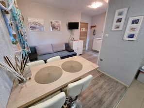 Dining area. kitchen, dining area, sleeping couch for 2 persons