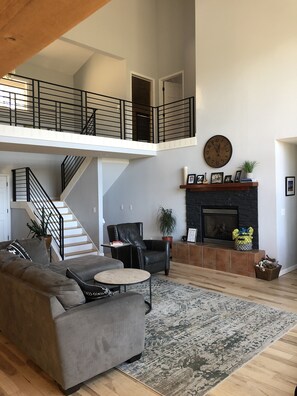 Open floor plan looking up to bedrooms.