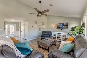 Top-Level Living Room with Deck Access