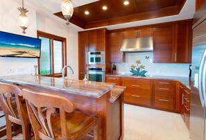 The gourmet kitchen is supremely well equipped and a chefs dream