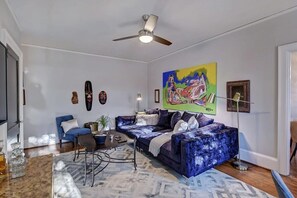 Comfy living room with velvet sofa