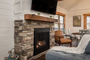 Warm, gas fireplace to make for cozy nights.