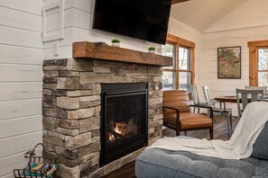 Warm, gas fireplace to make for cozy nights.