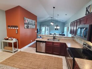 Kitchen into Dinning room into Living Room