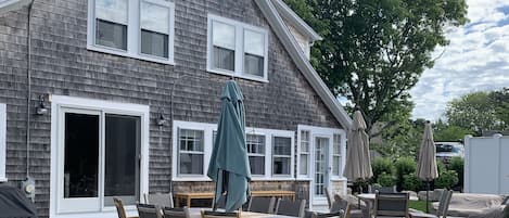 Outdoor seating/entertainment area for main house.