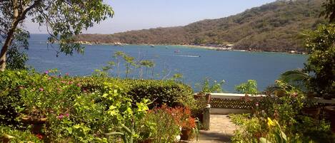 The view from the covered terrace of the sea and the island called Roqueta