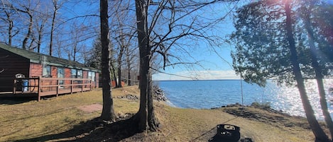 Firepit is right by the lake and the sounds of the water!