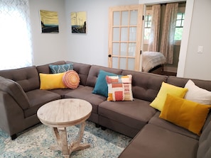 Sectional couch can be arranged any way you wish including into a queen bed.