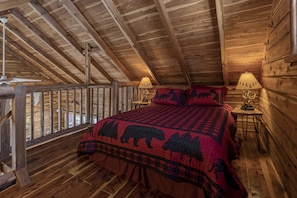 The 15x9ft loft features a comfy queen bed w/ thick Novafoam memory foam topper.