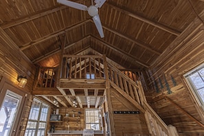 The 18ft ceiling gives the log cabin a very open & spacious feeling.