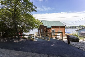 Beautiful Amish-built Western Red Cedar log cabin. Perfect for a cozy getaway.