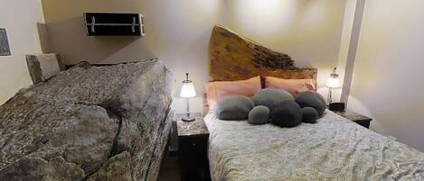 The "Rock Room" has a Queen size Bed, lounging area and a gas Fireplace


