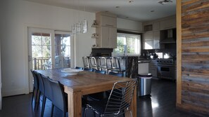 Open concept dining room and living room, with open access to living room. BBQ