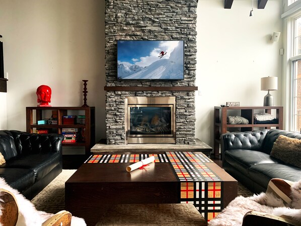 Beautiful, open concept living room with gas fireplace