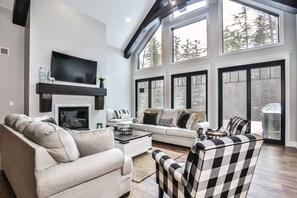 Gorgeous bright living room to gather around a cozy fire