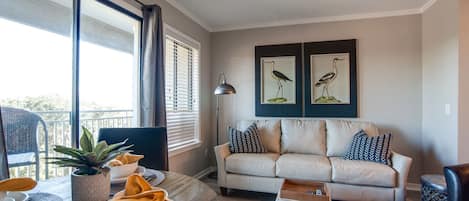 Carolina Beach Club 428 - Living Area - Beautiful updated unit with new furniture and easy access to the balcony.
