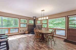 Spacious dining area great for gathering with friends for a meal or games