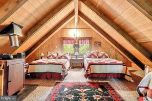 Loft with two double beds.