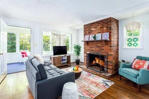 Relax in our cozy living room with a good book or enjoying your favorite series on our Smart TV