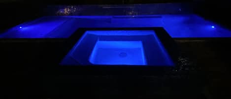 Pool-spa at night. Many LED colors to chose from. 