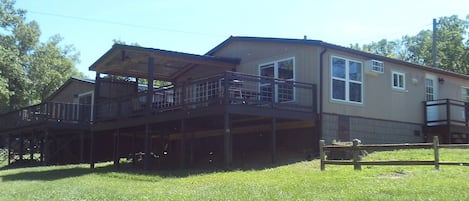 view from playground , lakeside  looking back at cottage 