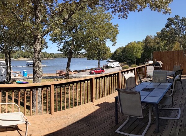 sitting on deck, looking at lake, chilling out