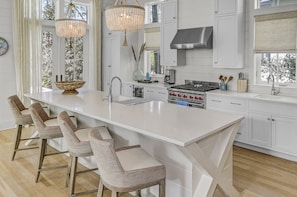 First Floor Kitchen with Stainless Steel Appliances and Large Center Island