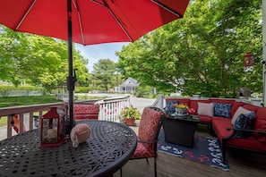 Image a sunny day outside with your close ones enjoying the outdoor seating at the patio table, couch, and gazebo pictured here in our side yard under the old maple tree! Behind the Denison Home is the Carriage House and we can accommodate additional guests in our four charming private rooms, nautically themed as well :-) 

Recently added fire table and outdoor couch- Welcome a...