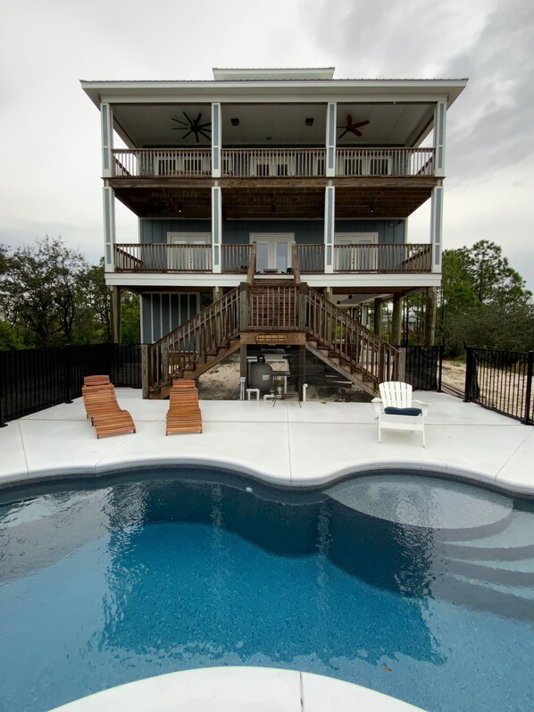 Back of house with the new pool