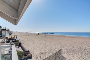 View from upstairs balcony facing south towards the pier. 