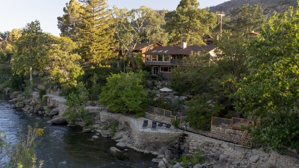 The beautiful Big View House waterfront on Kern River in the southern Sierra Nevada Mountains town of Kernville, California. Nestled in a quaint riverfront neighborhood. Meet the river as soon