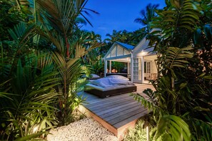 secluded and private garden entrance with exotic and rare flora 