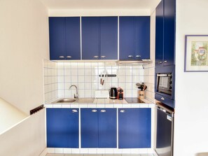 Cabinetry, Tap, Sink, Plumbing Fixture, Picture Frame, Countertop, Wood, Rectangle, Kitchen, Building