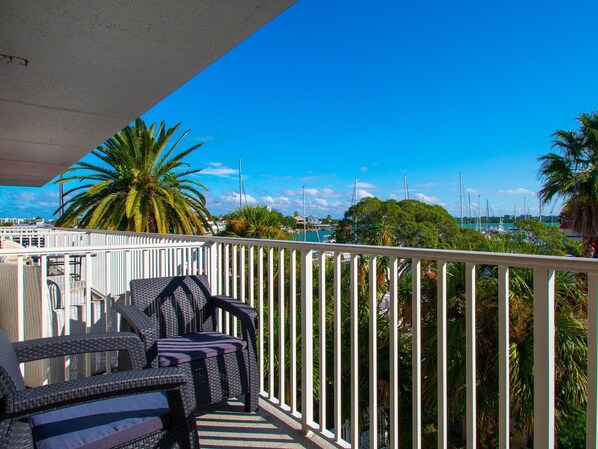 Overlook the sparkling intercoastal waters and on- site pool