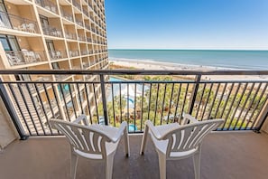 - Soak in uninterrupted views of the beach and sparkling coastline from your private balcony - Perfect for sipping your morning coffee or enjoying a peaceful sunset - Relax and unwind with the sound of the waves just steps from your seat